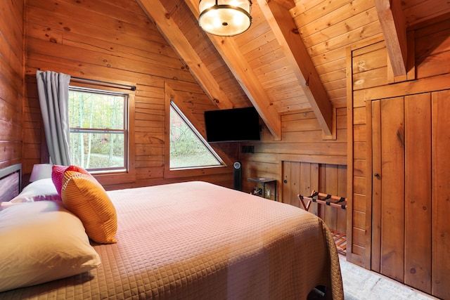 16651 Skinner Rd, Logan, OH 43138 - bedroom with wooden walls, wooden ceiling, and light wood-style floors