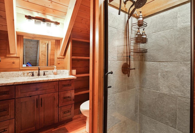 16651 Skinner Rd, Logan, OH 43138 - full bath with a stall shower, vanity, and wood finished floors
