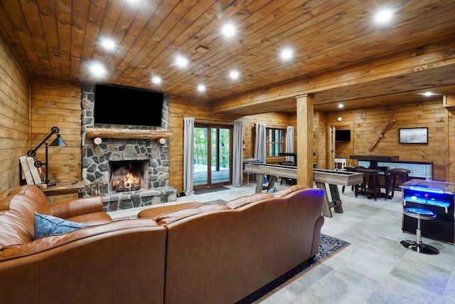 16651 Skinner Rd, Logan, OH 43138 - living area with wooden walls, a fireplace, recessed lighting, and wood ceiling