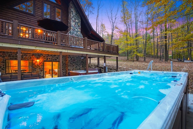 16651 Skinner Rd, Logan, OH 43138 - view of swimming pool with a hot tub and a deck