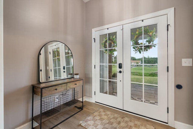 4881 Hoover Rd, Grove City, OH 43123 - doorway to outside with french doors and wood finished floors