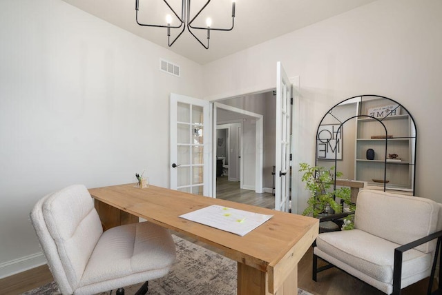 4881 Hoover Rd, Grove City, OH 43123 - office area featuring a chandelier, french doors, and wood finished floors