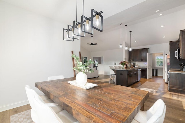 4881 Hoover Rd, Grove City, OH 43123 - dining space with wood finished floors, recessed lighting, ceiling fan, and high vaulted ceiling