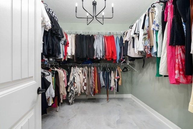 4881 Hoover Rd, Grove City, OH 43123 - spacious closet featuring a chandelier