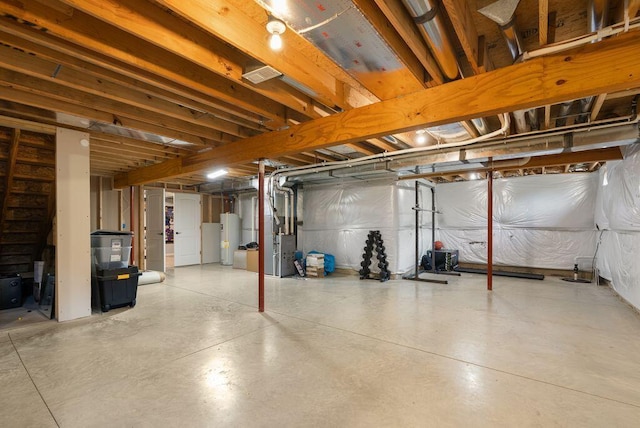 4881 Hoover Rd, Grove City, OH 43123 - unfinished basement featuring gas water heater and heating unit