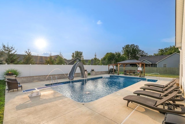 4881 Hoover Rd, Grove City, OH 43123 - view of swimming pool with a gazebo, a patio, a fenced backyard, and a water slide