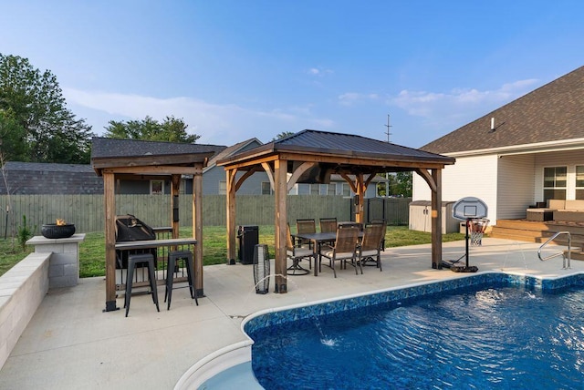 4881 Hoover Rd, Grove City, OH 43123 - view of swimming pool with a gazebo, outdoor dining area, and a patio