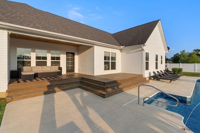 4881 Hoover Rd, Grove City, OH 43123 - back of house featuring outdoor lounge area, a patio, a shingled roof, and a deck