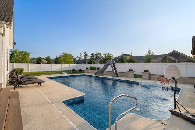 4881 Hoover Rd, Grove City, OH 43123 - view of pool with a water slide, a fenced backyard, and a patio