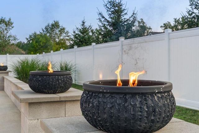 4881 Hoover Rd, Grove City, OH 43123 - view of patio / terrace with a fire pit