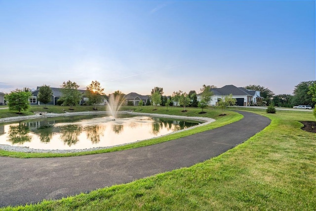 4881 Hoover Rd, Grove City, OH 43123 - view of home's community featuring a water view and a lawn