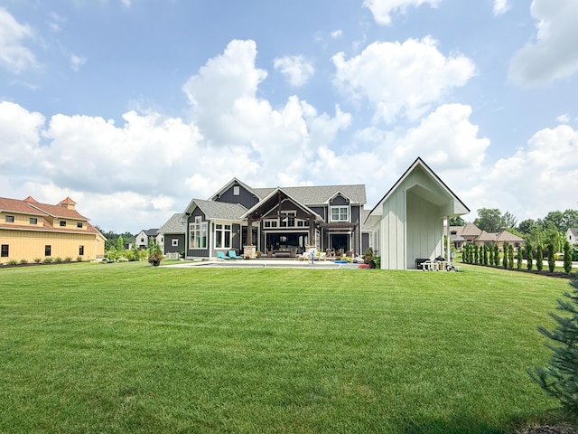 5470 Maple Glen Dr, Galena, OH 43021 - rear view of house featuring a lawn and board and batten siding