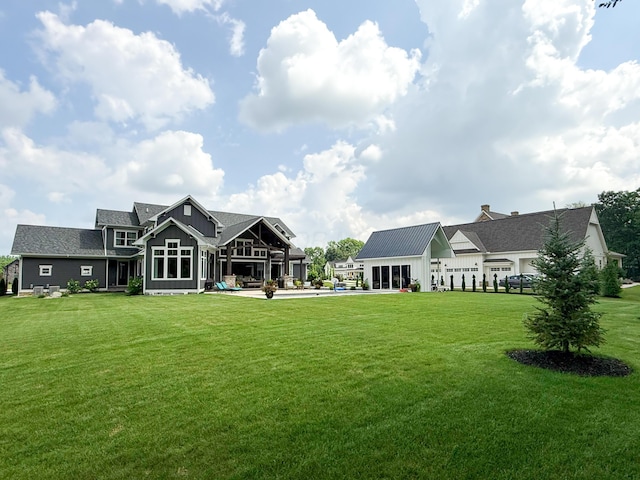 5470 Maple Glen Dr, Galena, OH 43021 - rear view of property featuring a lawn and board and batten siding