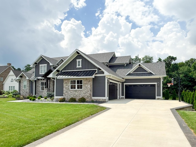 5470 Maple Glen Dr, Galena, OH 43021 - craftsman-style home with board and batten siding, stone siding, an attached garage, a shingled roof, and driveway
