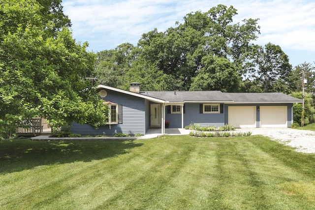 1725 Graham Dr NE, Lancaster, OH 43130 - single story home with driveway, a chimney, a front yard, and a garage
