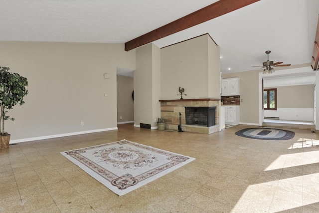 1725 Graham Dr NE, Lancaster, OH 43130 - unfurnished living room featuring ceiling fan and a fireplace with raised hearth