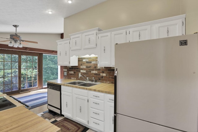 1725 Graham Dr NE, Lancaster, OH 43130 - kitchen with freestanding refrigerator, dishwashing machine, ceiling fan, light countertops, and white cabinets