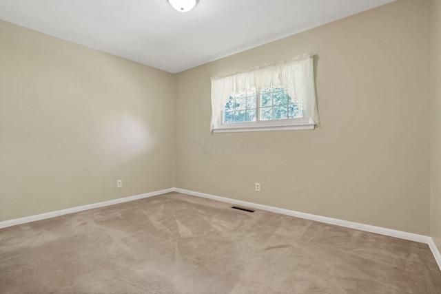 1725 Graham Dr NE, Lancaster, OH 43130 - carpeted spare room with baseboards