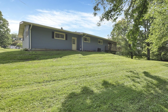 1725 Graham Dr NE, Lancaster, OH 43130 - rear view of property with a lawn