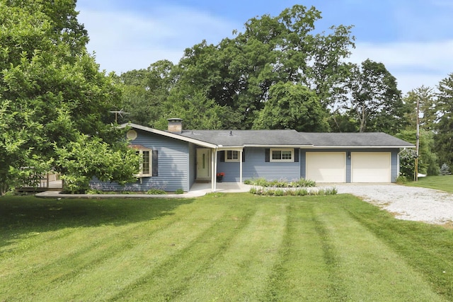 1725 Graham Dr NE, Lancaster, OH 43130 - ranch-style home featuring gravel driveway, a front yard, a chimney, and an attached garage