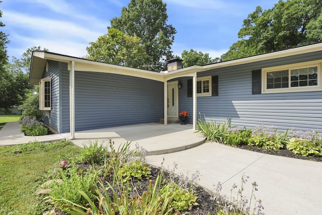 1725 Graham Dr NE, Lancaster, OH 43130 - ranch-style home with a chimney