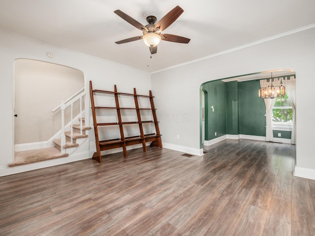 366 S Richardson Ave, Columbus, OH 43204 - spare room featuring arched walkways, a ceiling fan, wood finished floors, crown molding, and a chandelier