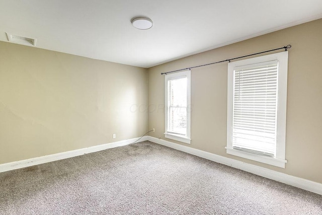 211 Buckingham St, Newark, OH 43055 - carpeted empty room with baseboards