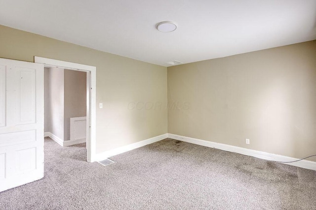 211 Buckingham St, Newark, OH 43055 - carpeted spare room featuring baseboards