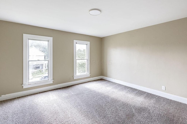 211 Buckingham St, Newark, OH 43055 - carpeted spare room featuring baseboards