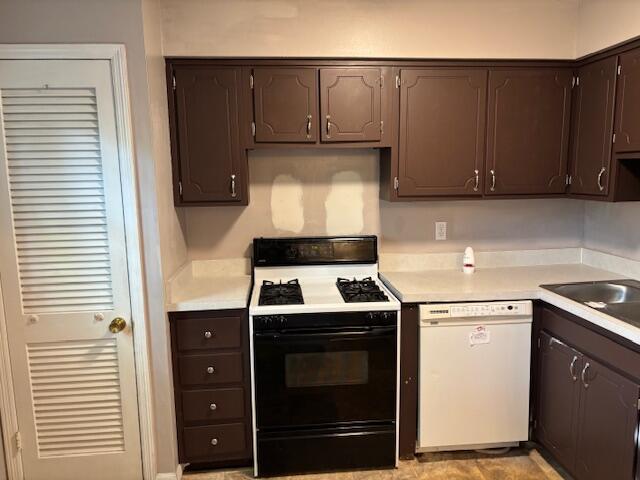 2382 Hardesty Dr S Unit Q5, Columbus, OH 43204 - kitchen featuring range with gas cooktop, dishwasher, dark brown cabinets, and light countertops