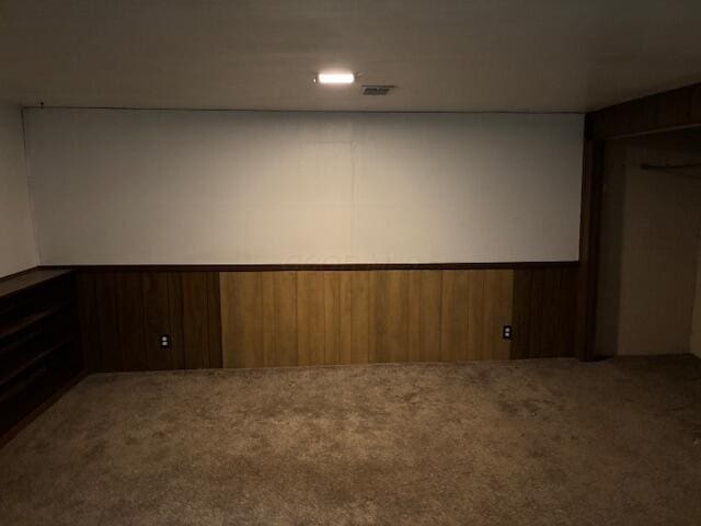 2382 Hardesty Dr S Unit Q5, Columbus, OH 43204 - unfurnished room featuring carpet floors, a wainscoted wall, and wood walls