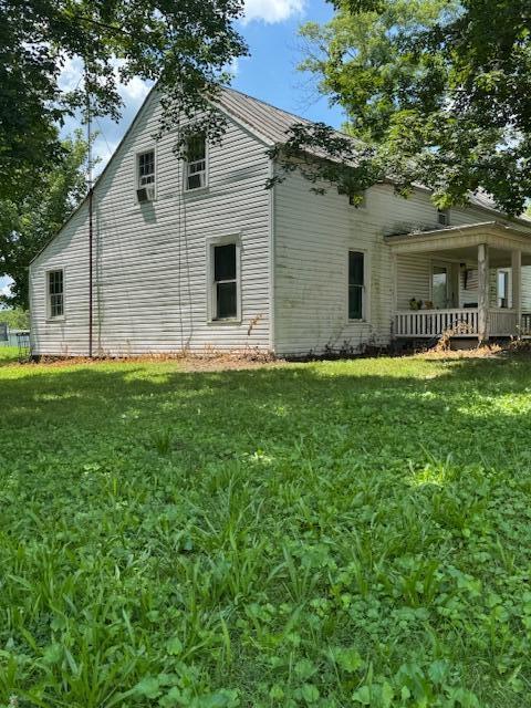 12690 Pleasant Valley Rd, Chillicothe, OH 45601 - view of property exterior featuring a yard and a porch