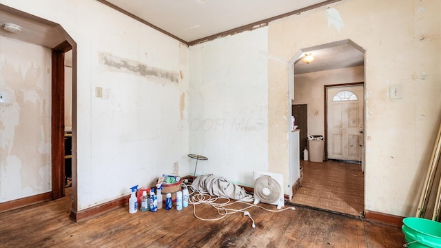 1822 W Mound St, Columbus, OH 43223 - interior space featuring arched walkways, hardwood / wood-style floors, a smoke detector, and ornamental molding