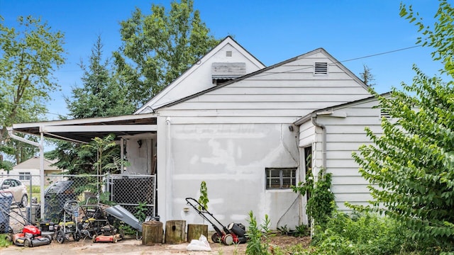 1822 W Mound St, Columbus, OH 43223 - view of home's exterior featuring an attached carport
