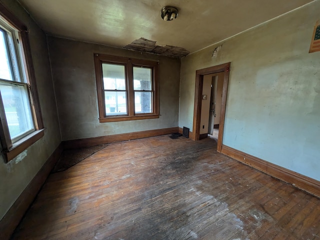 1325 Smith Rd, Columbus, OH 43207 - empty room with hardwood / wood-style flooring and baseboards