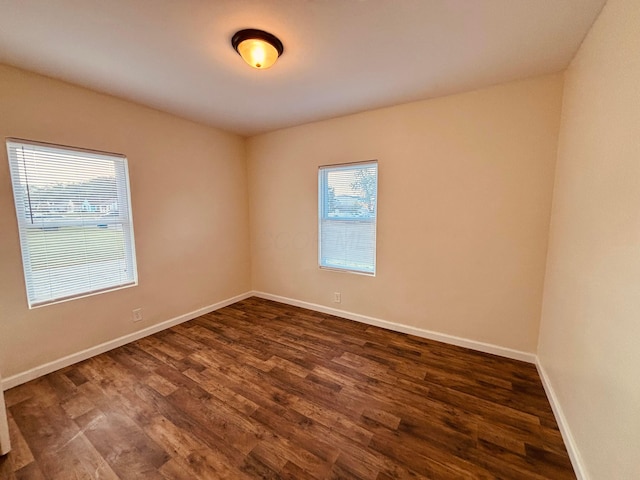 3067 E 13th Ave, Columbus, OH 43219 - spare room with plenty of natural light and dark wood-type flooring