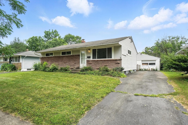 3563 Astor Ave, Columbus, OH 43227 - ranch-style home with a front lawn, brick siding, a chimney, a detached garage, and asphalt driveway