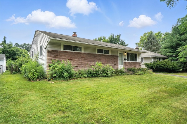 3563 Astor Ave, Columbus, OH 43227 - single story home featuring brick siding and a chimney