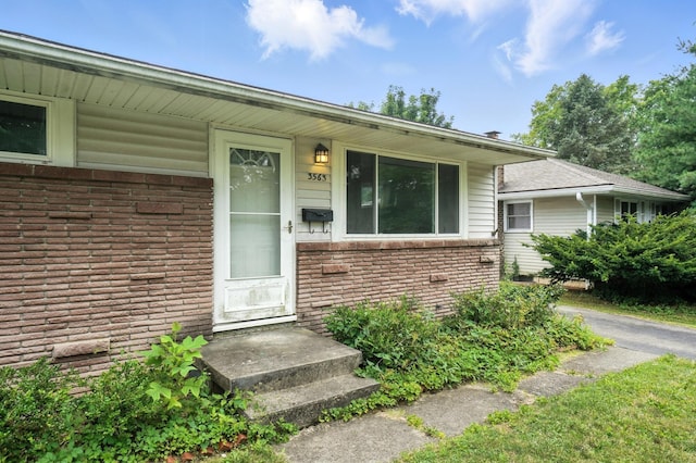 3563 Astor Ave, Columbus, OH 43227 - view of exterior entry featuring brick siding
