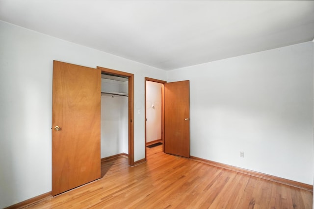 3563 Astor Ave, Columbus, OH 43227 - unfurnished bedroom featuring light wood-type flooring and a closet