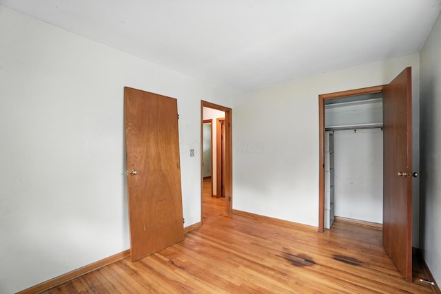 3563 Astor Ave, Columbus, OH 43227 - unfurnished bedroom featuring light wood-style floors and a closet