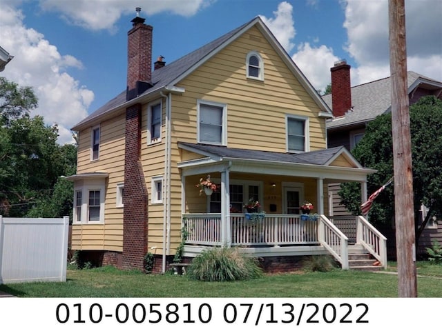639 Bulen Ave, Columbus, OH 43205 - view of front of property with covered porch and a chimney