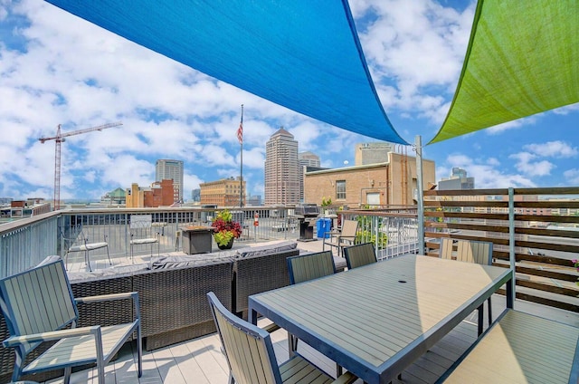 110 N 3rd St Unit 707, Columbus, OH 43215 - balcony with outdoor dining space and a city view