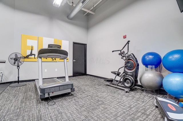 110 N 3rd St Unit 707, Columbus, OH 43215 - exercise room featuring a towering ceiling and carpet