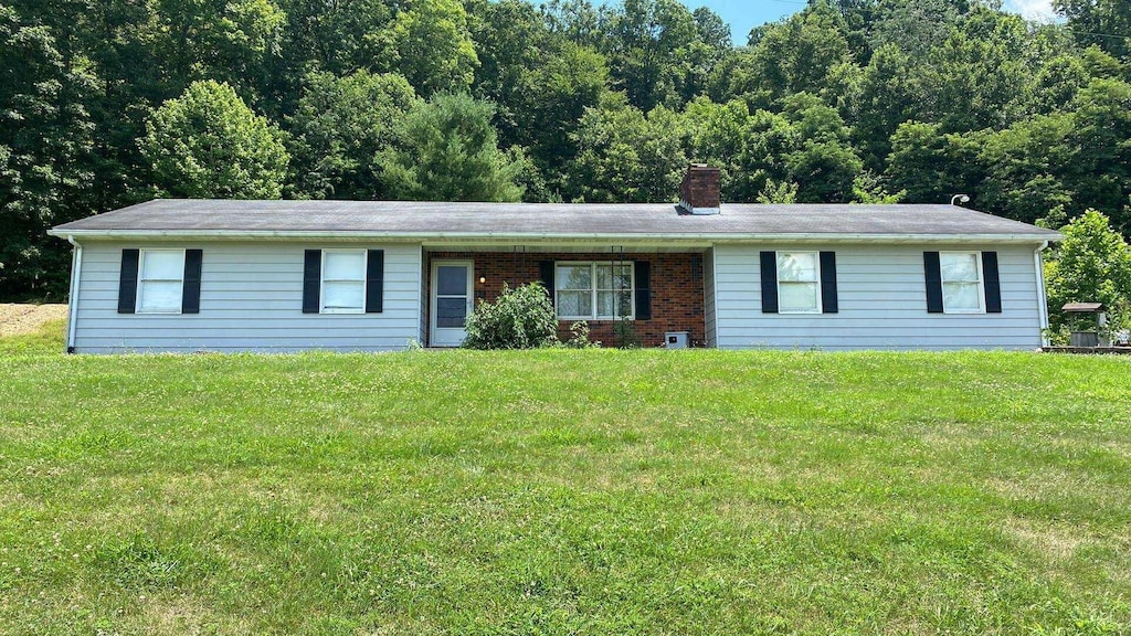 10794 State Route 772, Piketon, OH 45661 - single story home with a chimney and a front yard