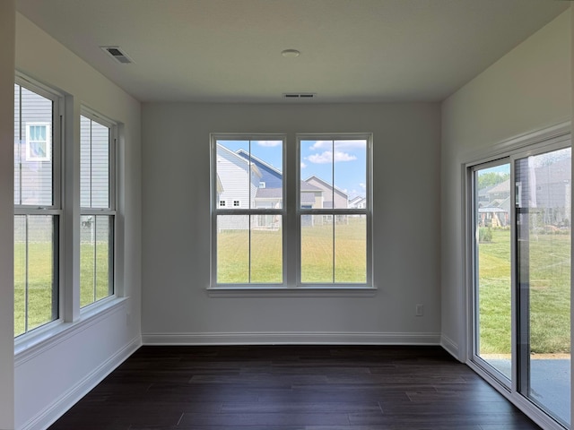 8760 Apricot Way Lot 1917, Plain City, OH 43064 - unfurnished dining area featuring plenty of natural light and dark wood-style flooring