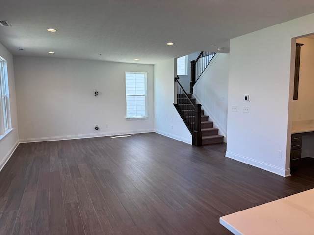 8760 Apricot Way Lot 1917, Plain City, OH 43064 - unfurnished living room featuring stairs, dark wood-style floors, and recessed lighting