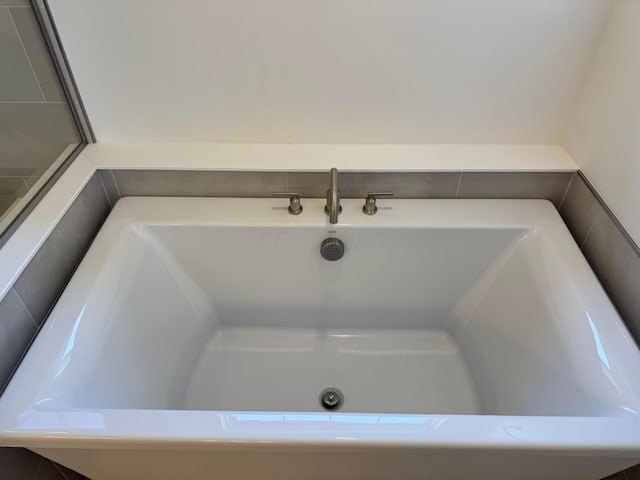 8760 Apricot Way Lot 1917, Plain City, OH 43064 - bathroom with a tub with jets
