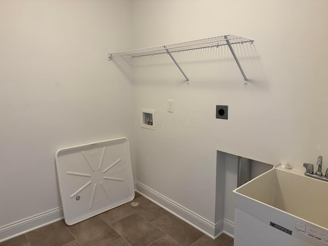8760 Apricot Way Lot 1917, Plain City, OH 43064 - washroom featuring hookup for a washing machine, hookup for an electric dryer, and dark tile patterned flooring