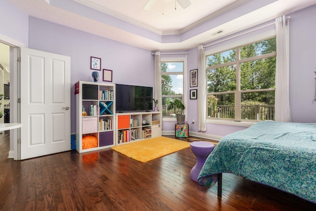 4881 Primrose Ct, Grove City, OH 43123 - bedroom featuring wood finished floors, a tray ceiling, and crown molding